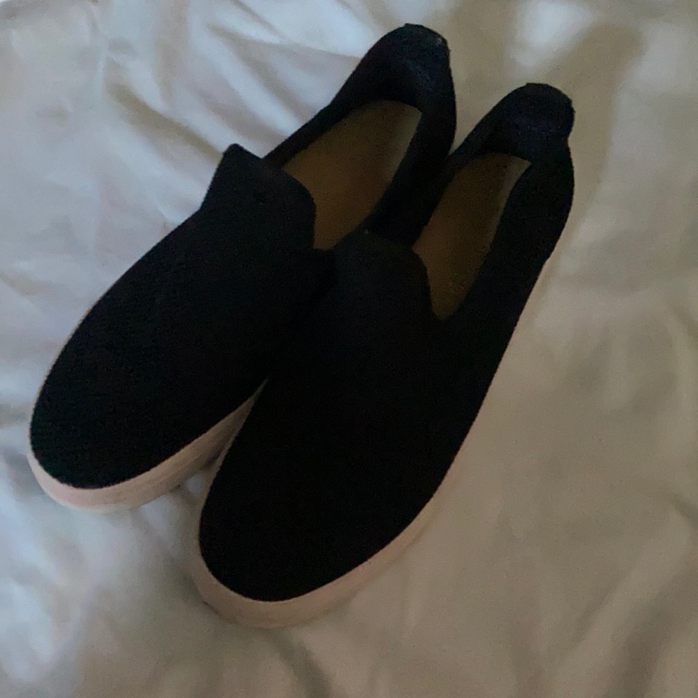 Barely worn black slip on sneakers